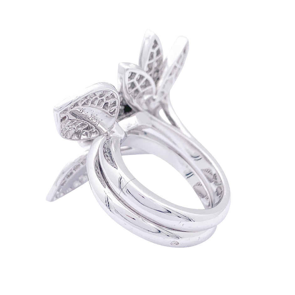 Van Cleef & Arpels "Lotus" ring in white gold and diamonds.