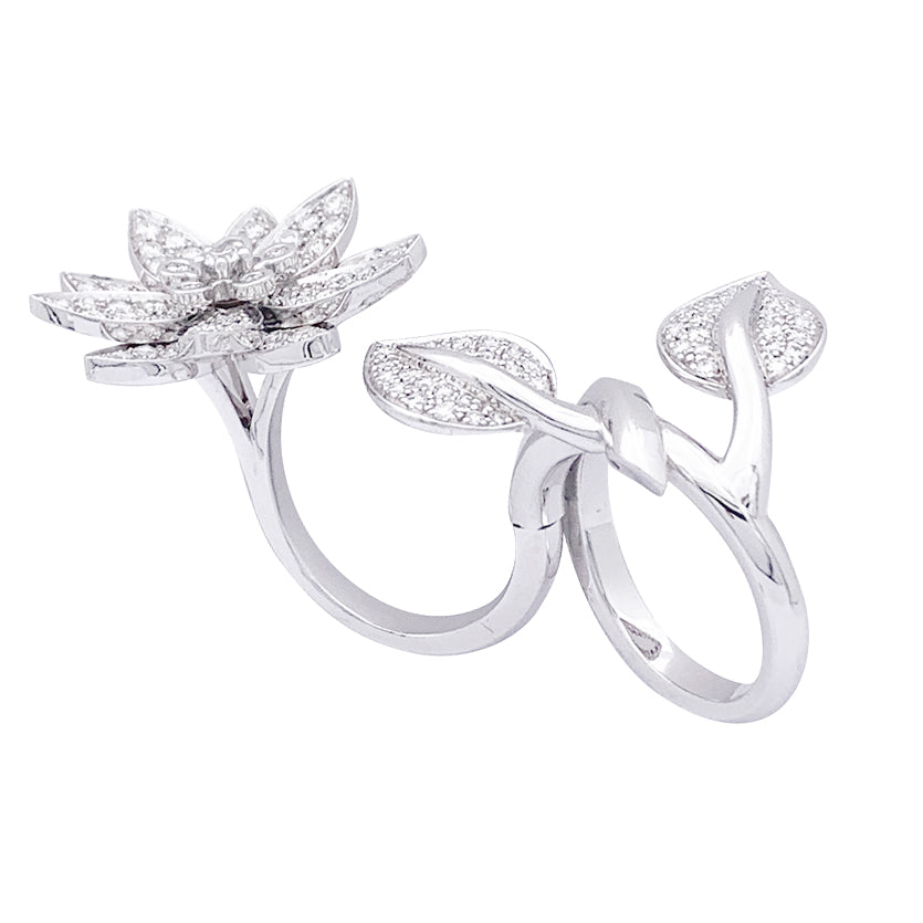 Van Cleef & Arpels "Lotus" ring in white gold and diamonds.
