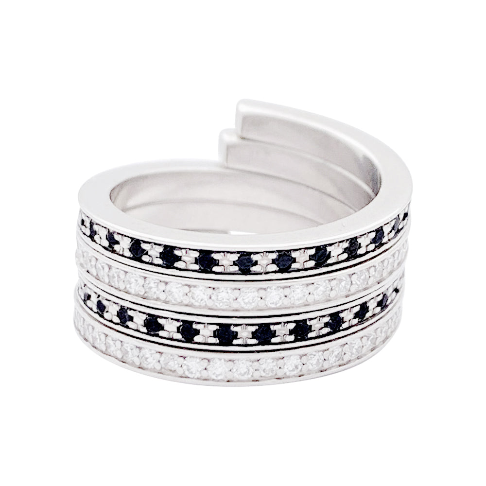 Bagues Dinh Van, "Spirale", or blanc, diamants et diamants noirs.
