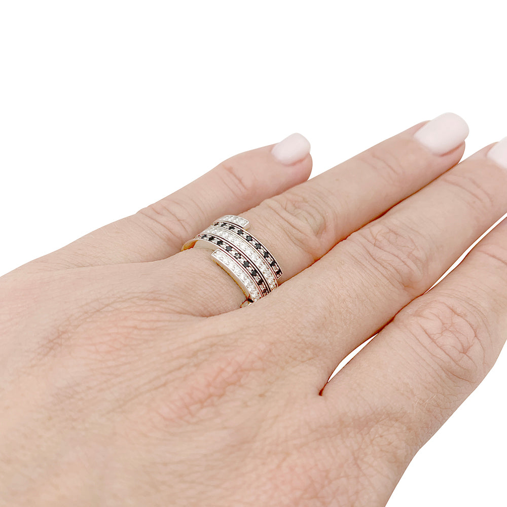 Dinh Van rings, "Spirale", white gold, diamonds and black diamonds.