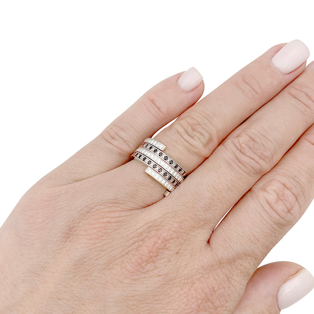 Dinh Van rings, "Spirale", white gold, diamonds and black diamonds.