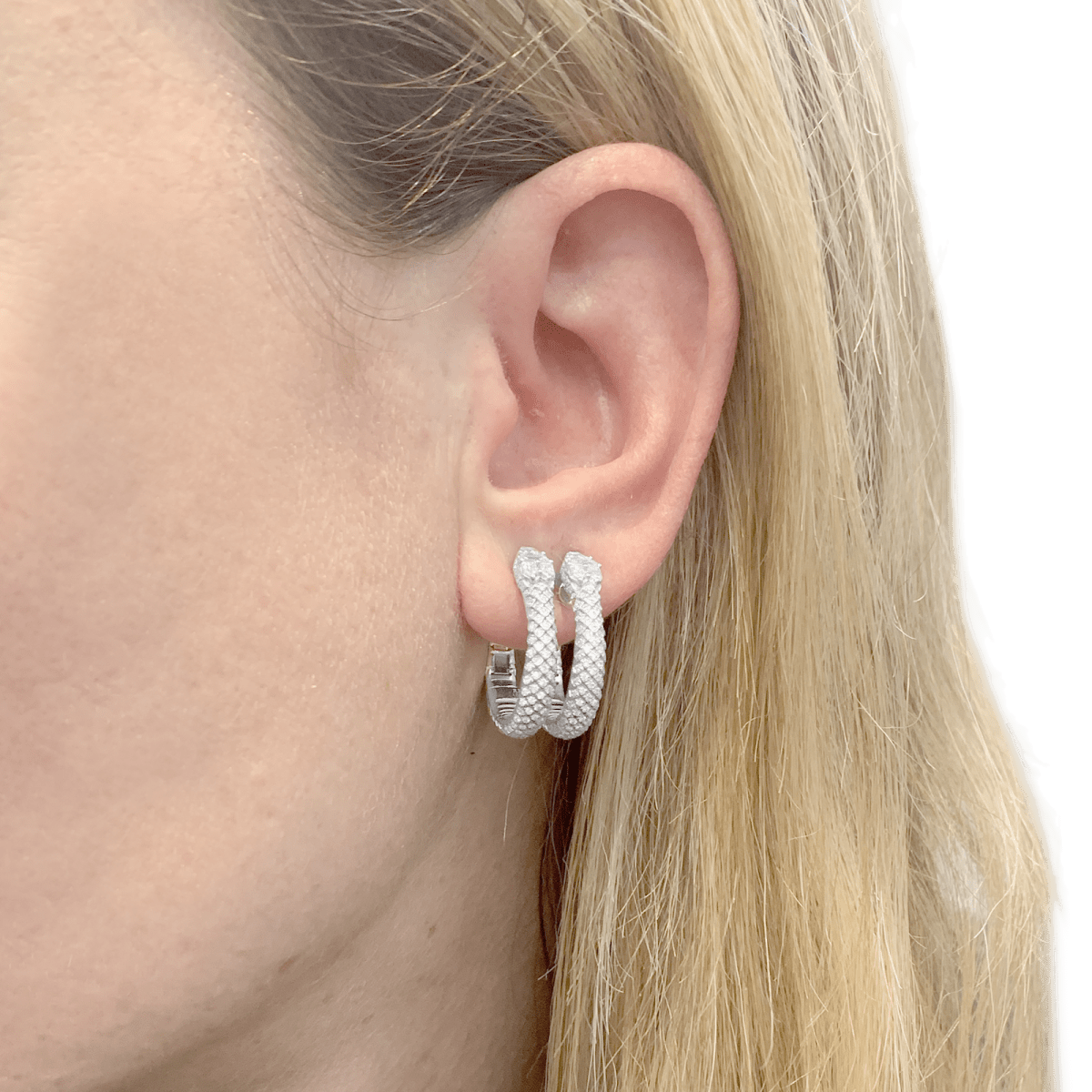 Boucles d'oreilles Repossi "Ophydienne", or blanc, diamants. - Maison Eloe