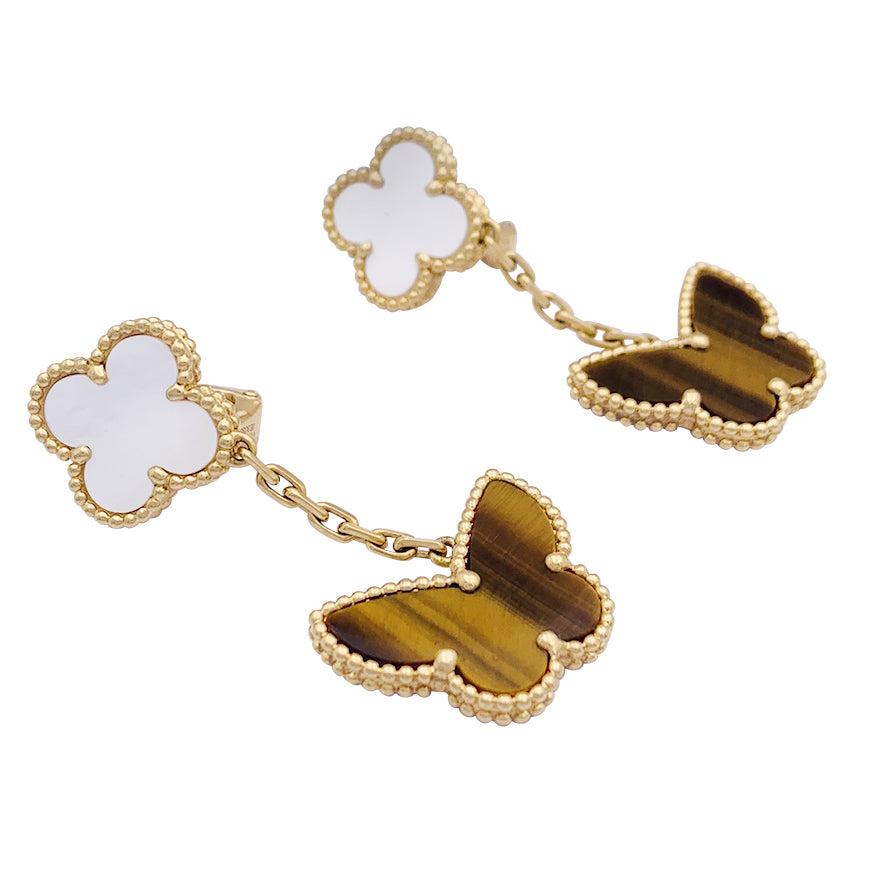 Boucles d'oreilles Van Cleef & Arpels "Lucky Alhambra" or jaune, nacre blanche, oeil de tigre.