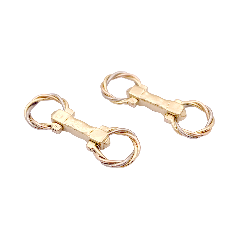 Boutons de manchette Cartier "Trinity", trois ors.