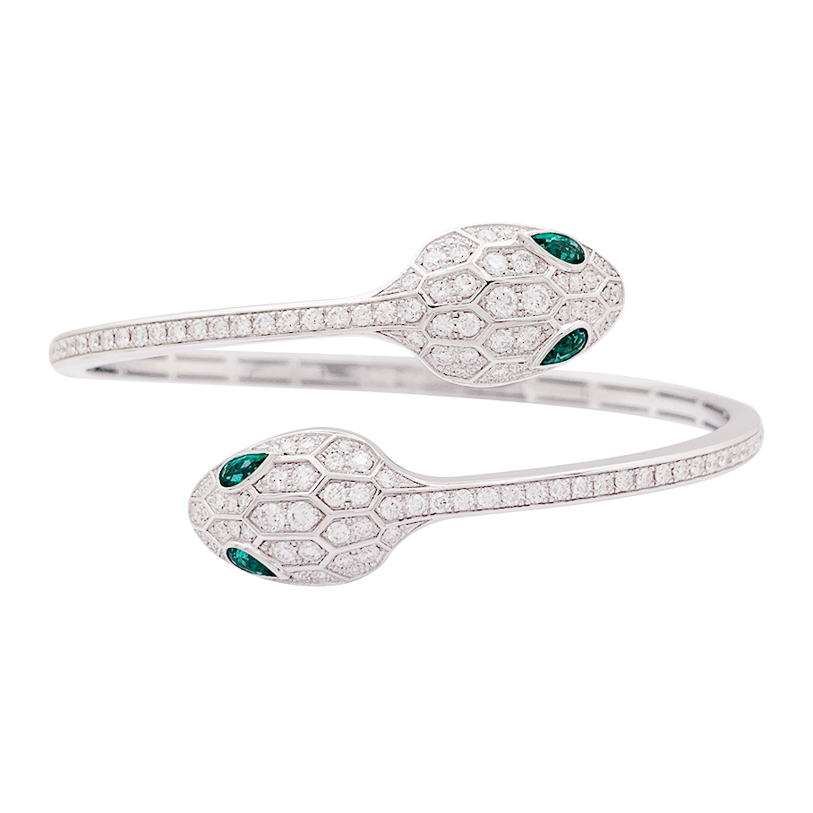 Bracelet Bulgari "Serpenti Seduttori" or blanc, diamants, émeraudes.