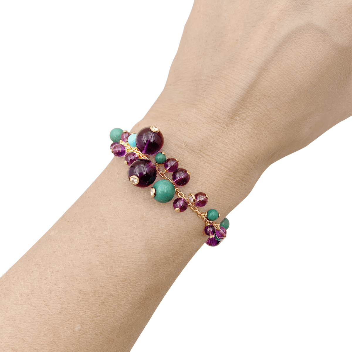 Bracelet CARTIER, modèle "Délices de Goa", or rose, améthyste, turquoises et diamants. - Maison Eloe