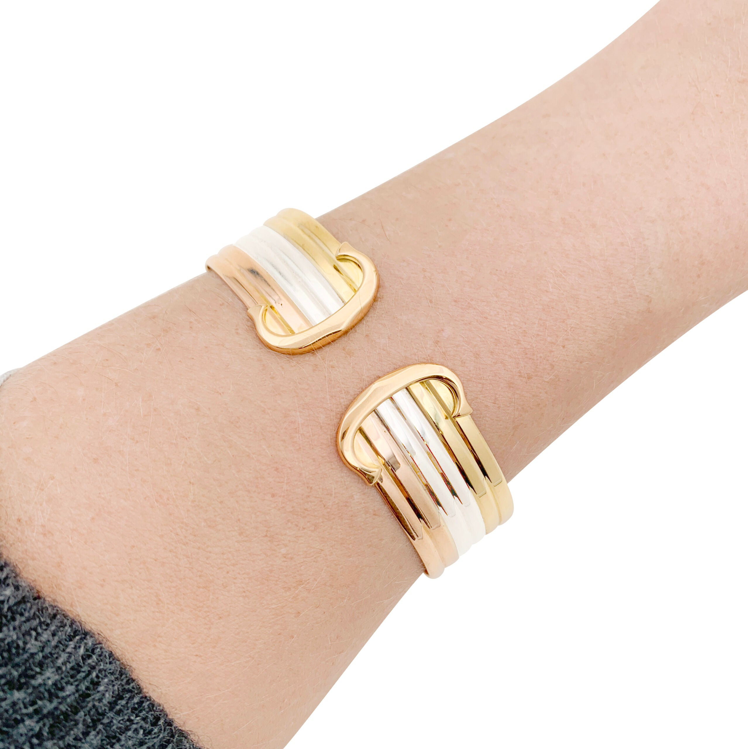Bracelet Cartier "Double C" trois ors.