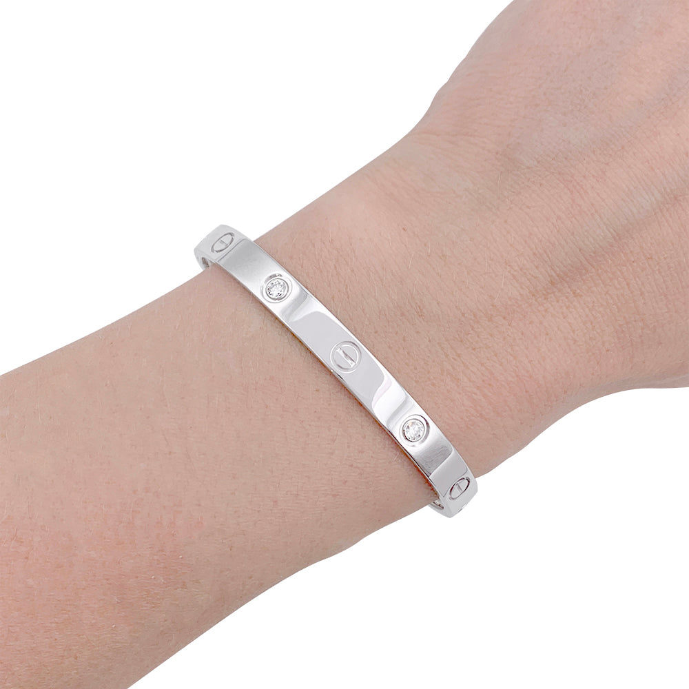 Cartier "Love" bracelet, white gold and diamonds.