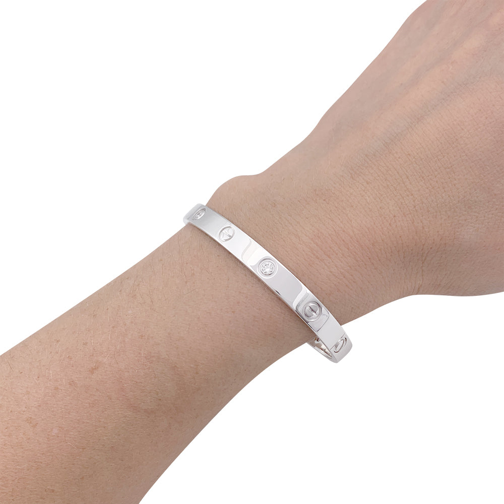 Cartier "Love" bracelet, white gold and diamonds.
