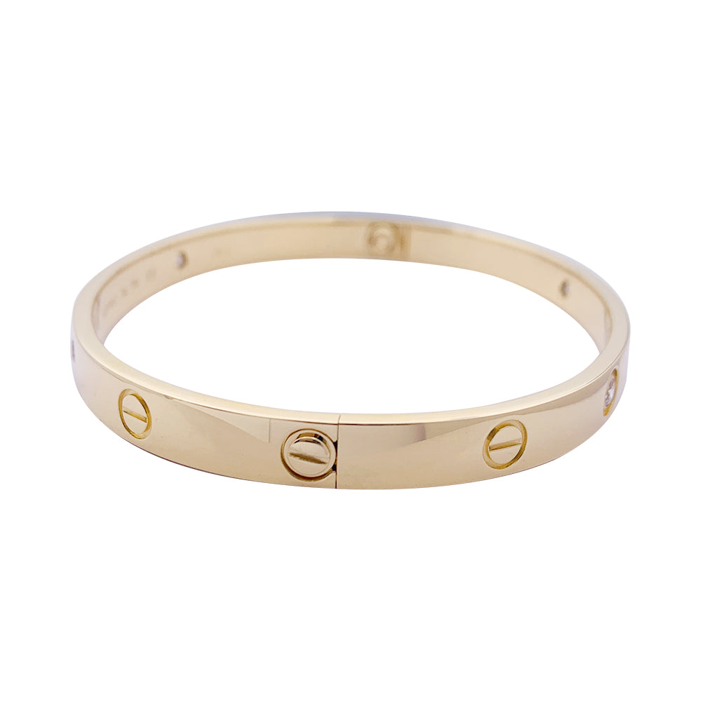 Cartier "Love" bracelet, yellow gold, diamonds.