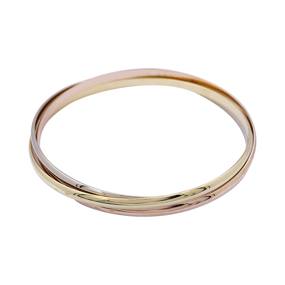 Cartier “Trinity” bracelet in three golds.