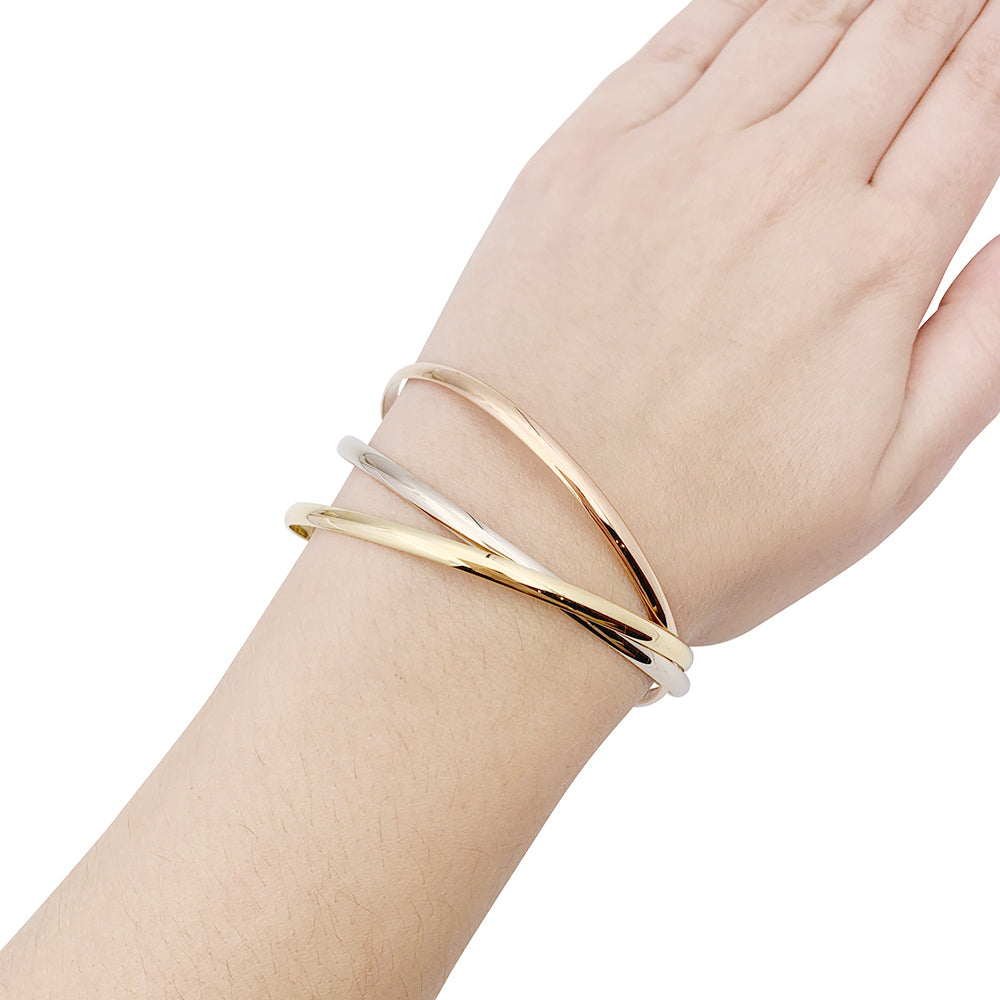 Cartier “Trinity” bracelet in three golds.