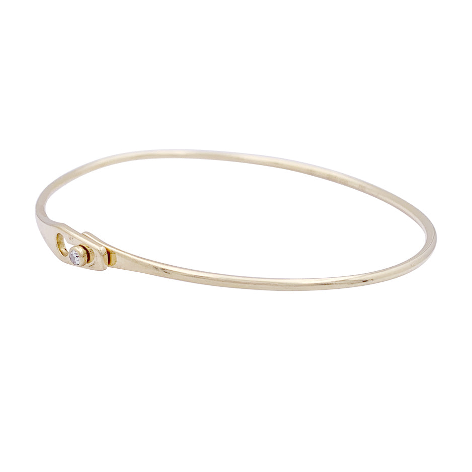 Dinh Van bracelet, "Lock" model in yellow gold, one diamond.