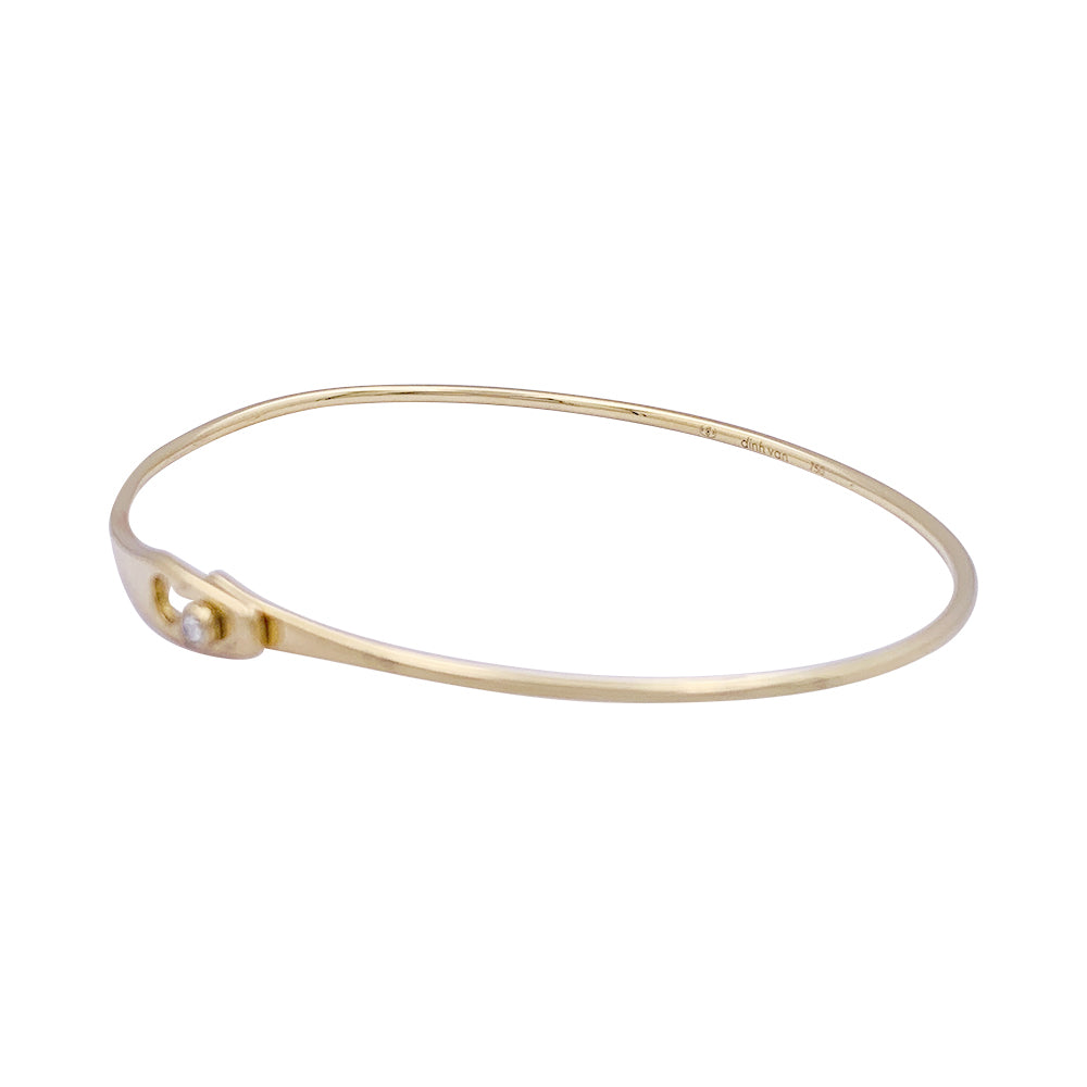 Dinh Van bracelet, "Lock" model in yellow gold, one diamond.