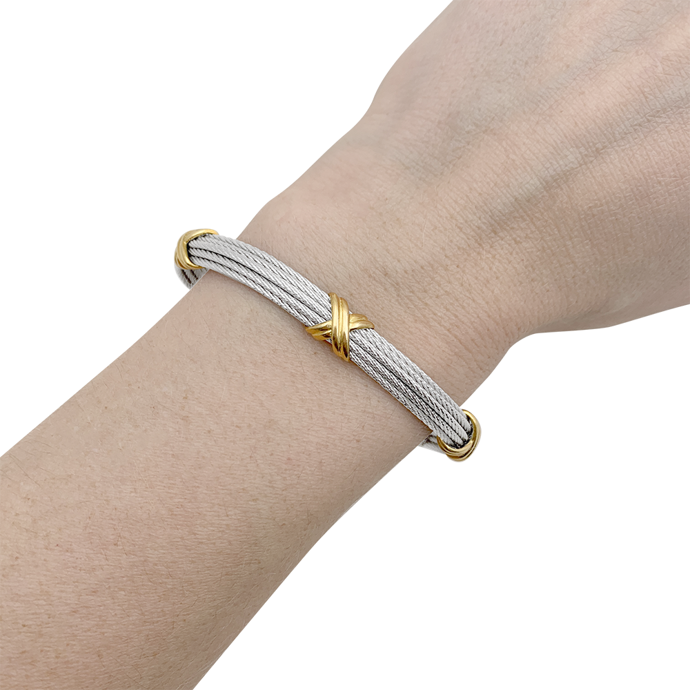 Bracelet Fred "Force 10" en acier et or jaune.