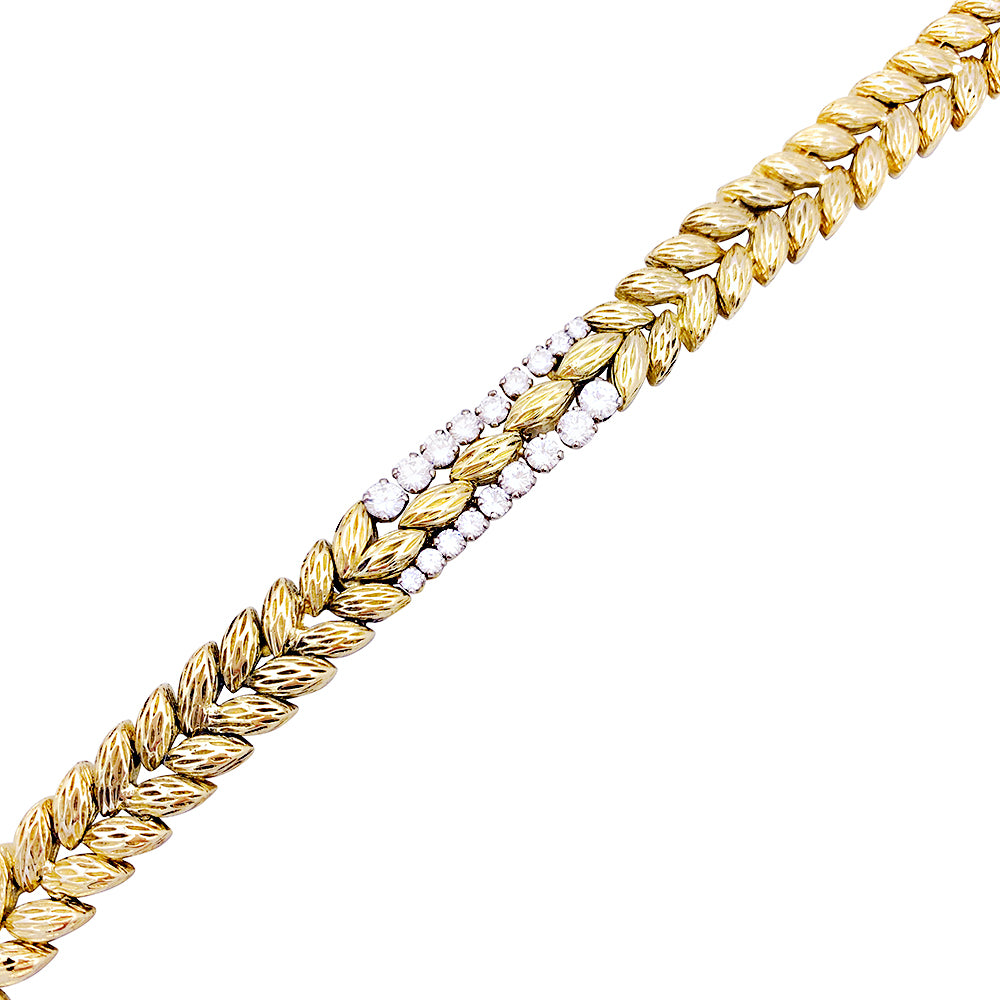 Vintage Mauboussin bracelet, yellow gold and diamonds.