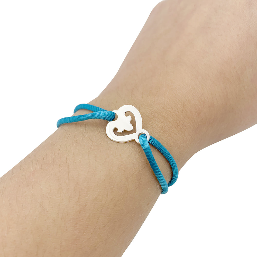 OJ Perrin "Heart Legend" white gold bracelet.