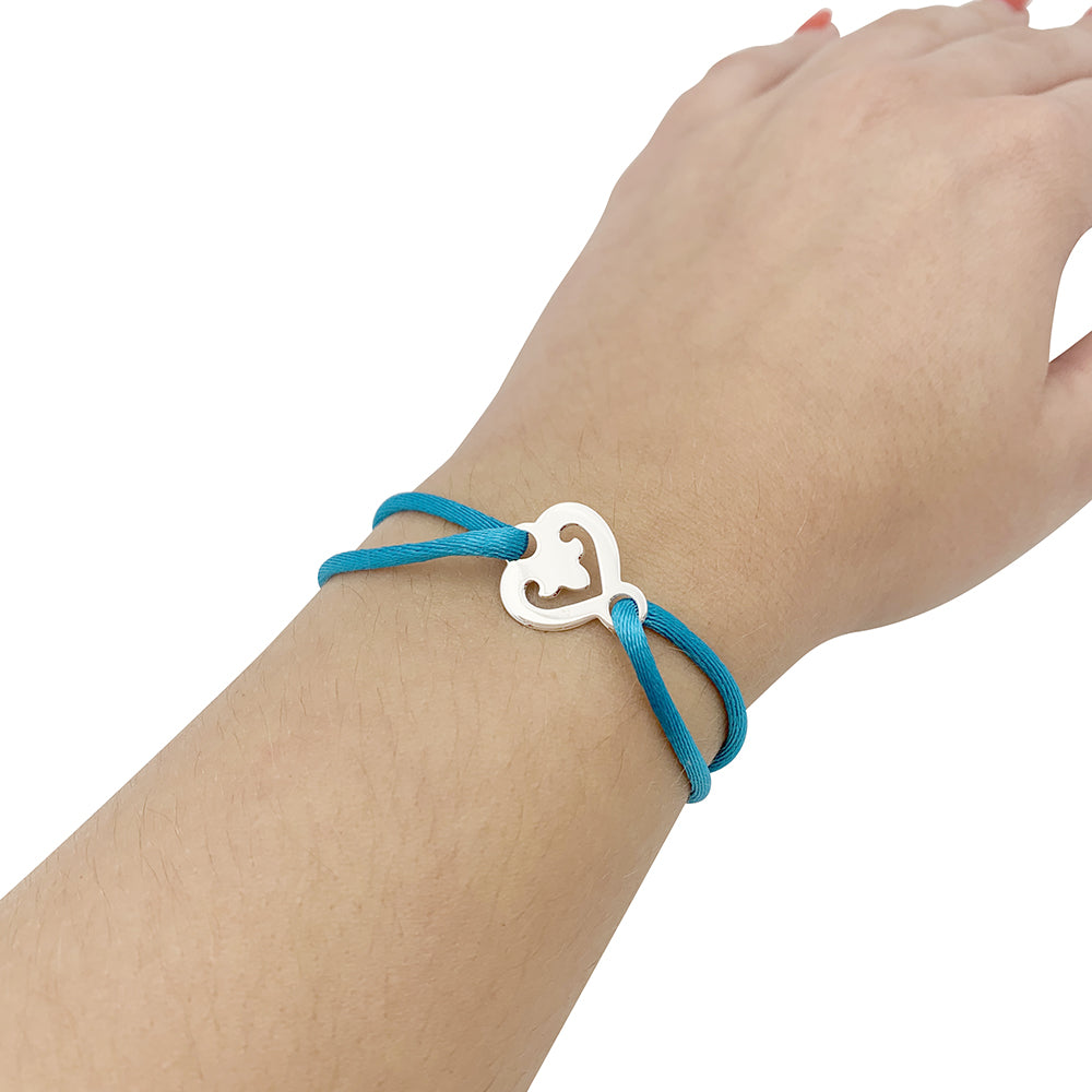 OJ Perrin "Heart Legend" white gold bracelet.