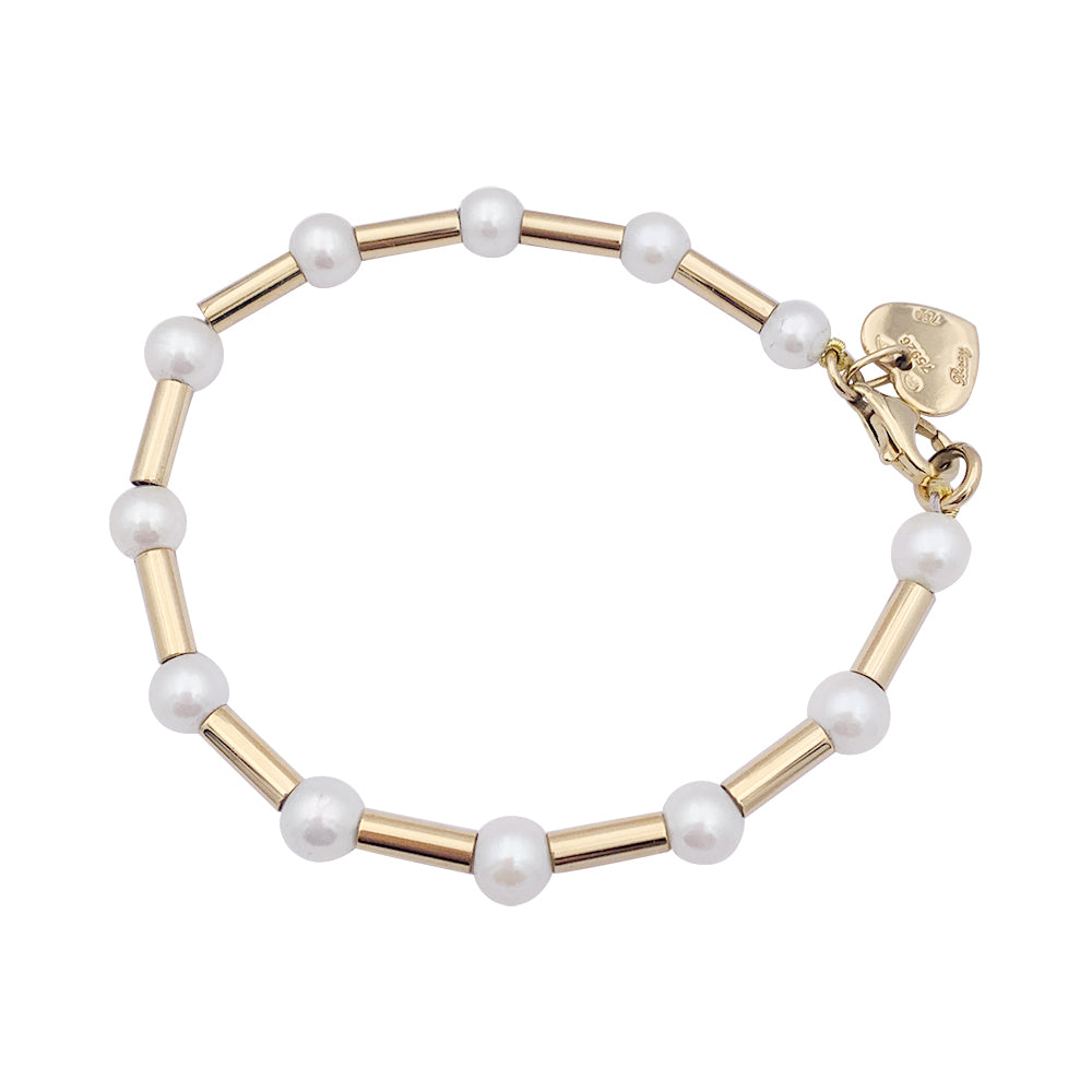 Poiray bracelet, "Roseau", yellow gold and pearls.