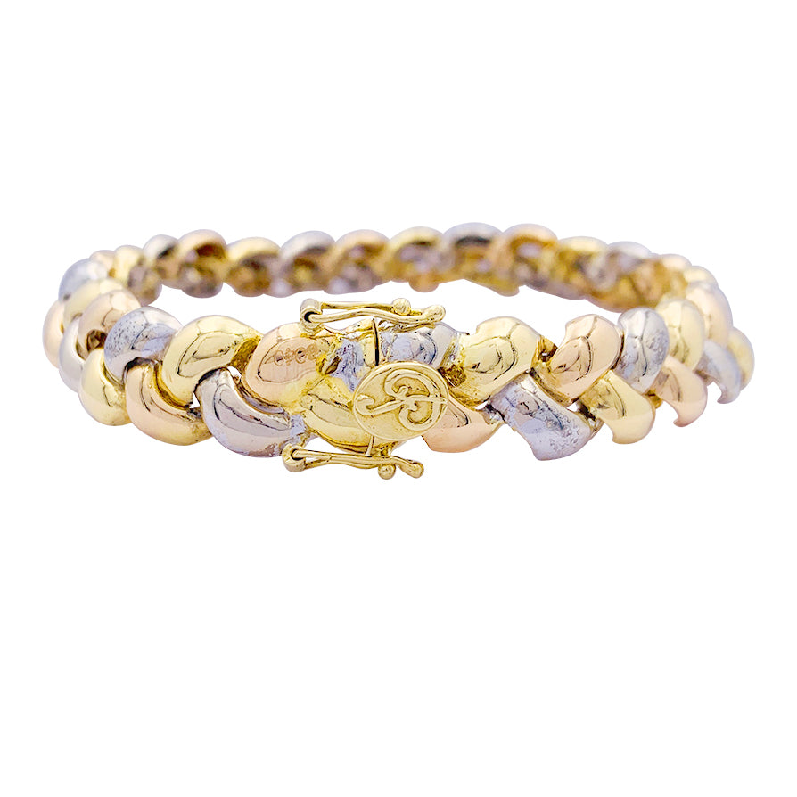 Poiray bracelet, "Tresse", three tones of gold.