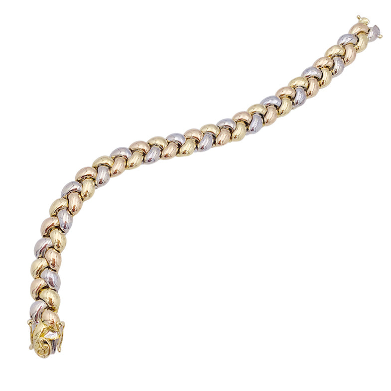 Poiray bracelet, "Tresse", three tones of gold.