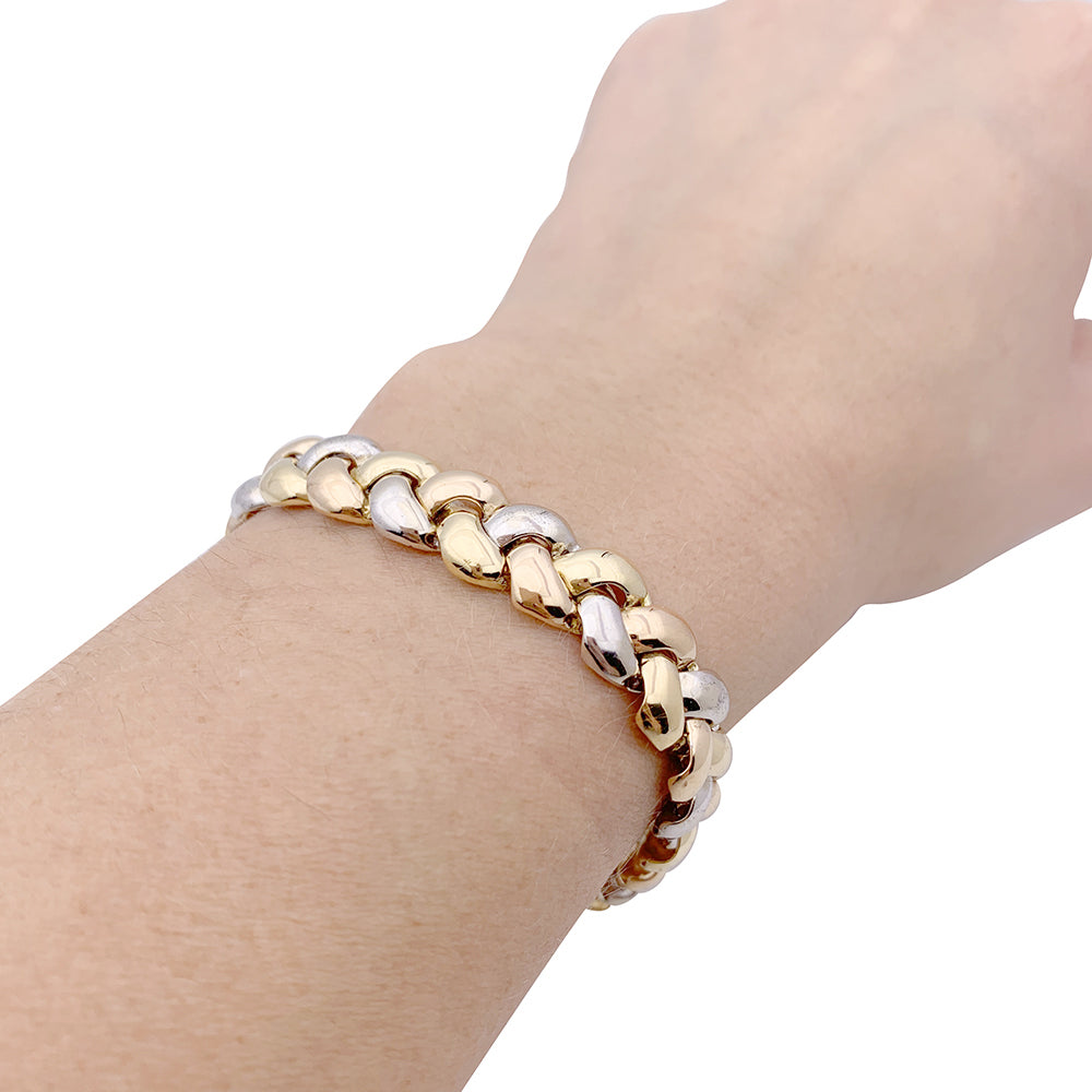 Poiray bracelet, "Tresse", three tones of gold.