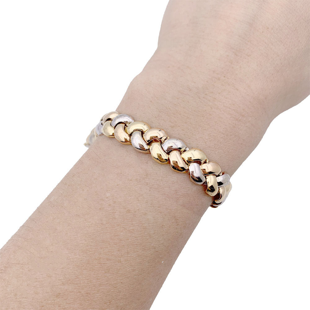 Bracelet Poiray, "Tresse", trois tons d'or.