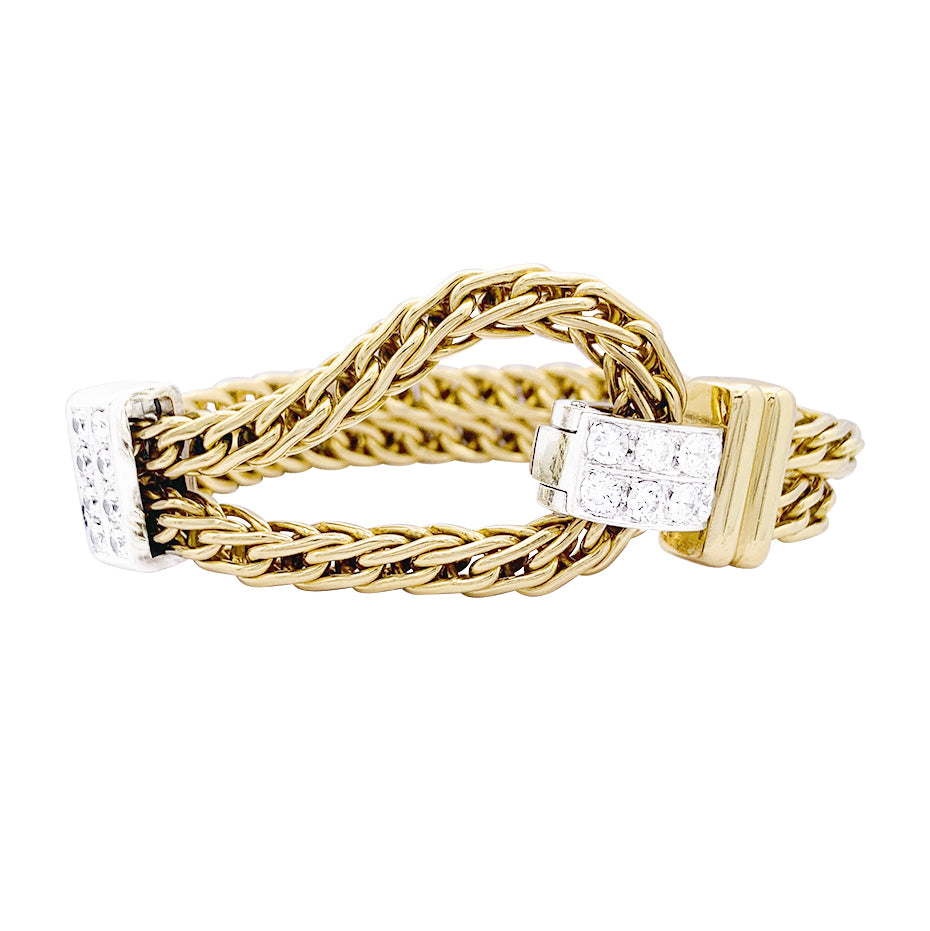 Pomellato bracelet, "Corde", two golds, diamonds.