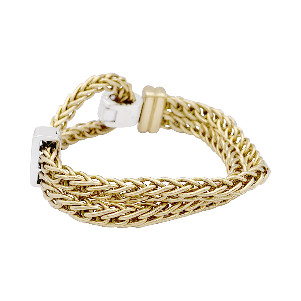 Pomellato bracelet, "Corde", two golds, diamonds.