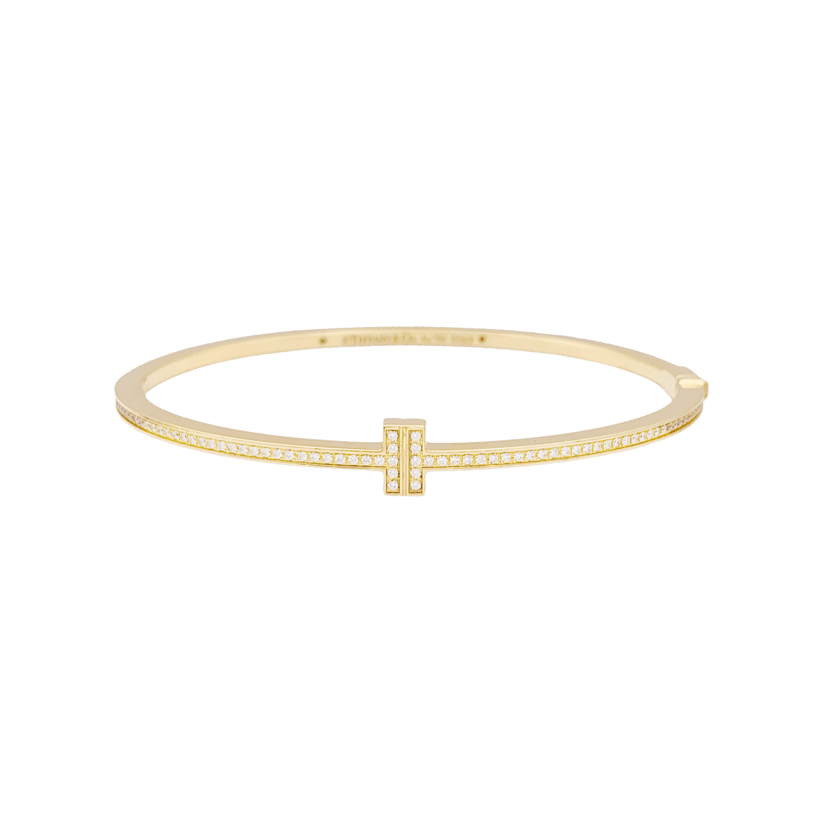 Bracelet Tiffany & Co., "Tiffany T", or jaune, diamants. - Maison Eloe