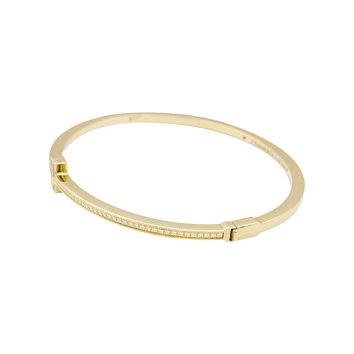 Bracelet Tiffany & Co., "Tiffany T", or jaune, diamants. - Maison Eloe