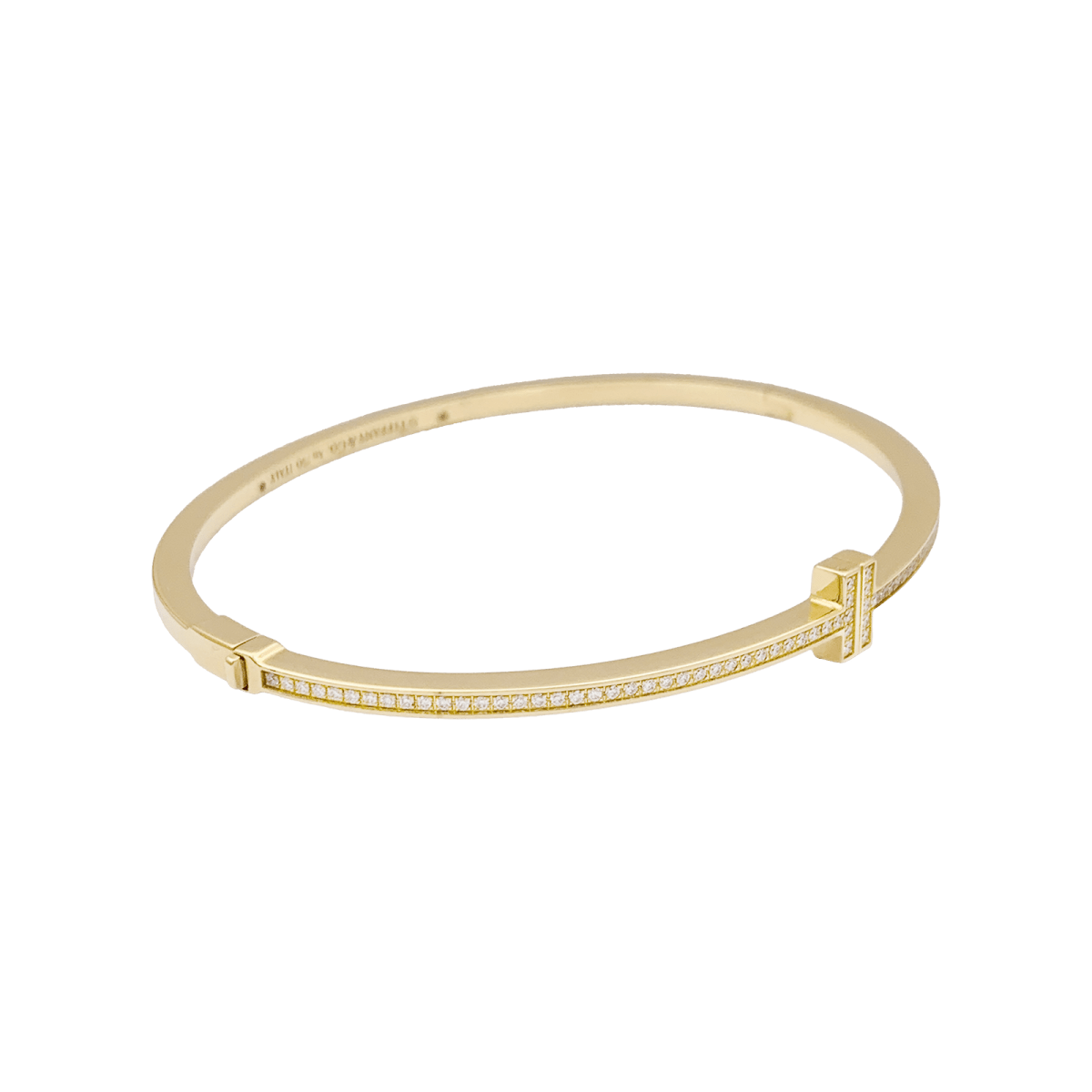 Bracelet Tiffany & Co., "Tiffany T", or jaune, diamants. - Maison Eloe