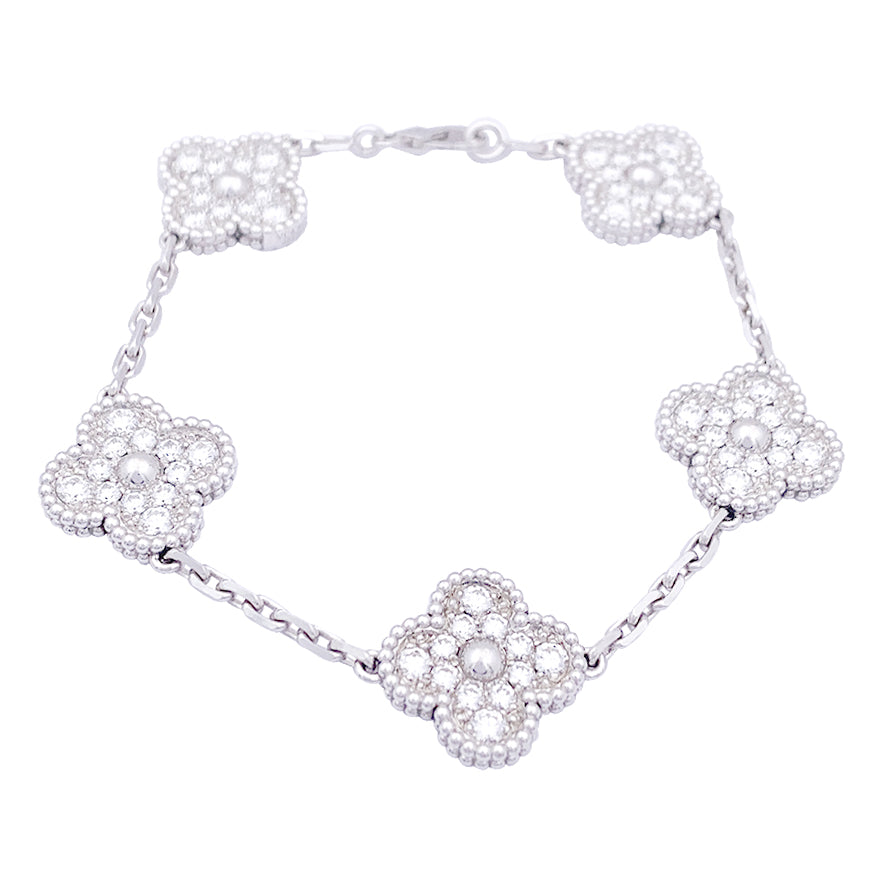 Bracelet Van Cleef & Arpels, "Vintage Alhambra", or blanc, diamants.