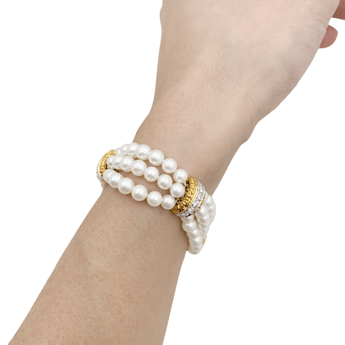 Bracelet Van Cleef & Arpels, deux ors, diamants, perles. - Maison Eloe