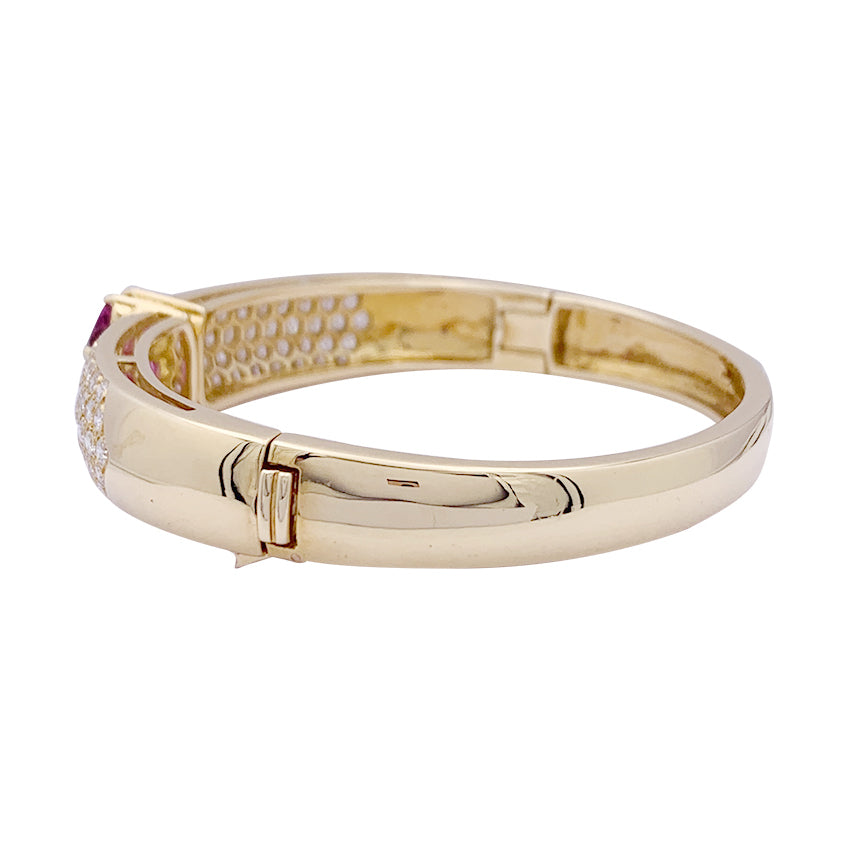 Van Cleef & Arpels bracelet in yellow gold, diamonds, pink sapphires.