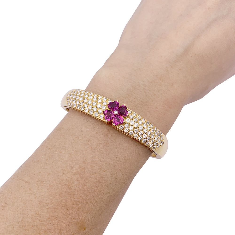 Van Cleef & Arpels bracelet in yellow gold, diamonds, pink sapphires.