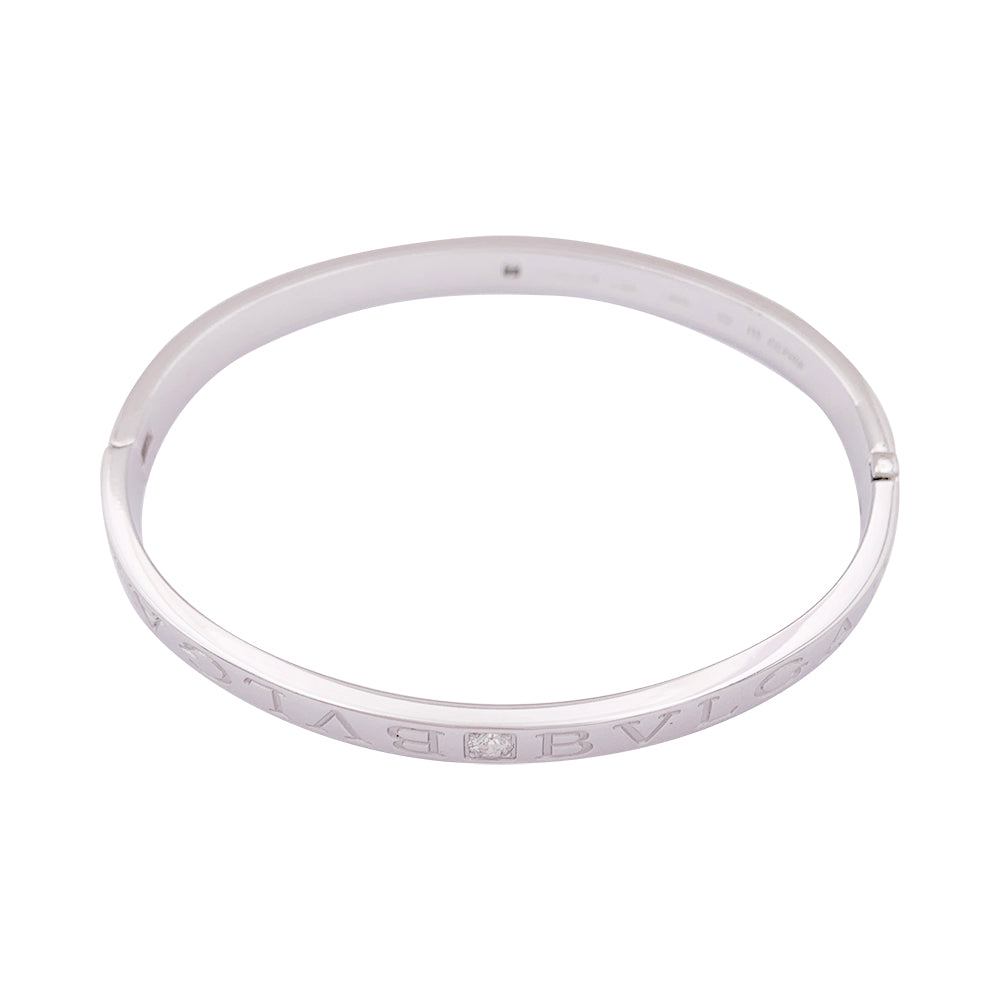 Bracelet jonc Bulgari "Bulgari Bulgari" or blanc, diamants.