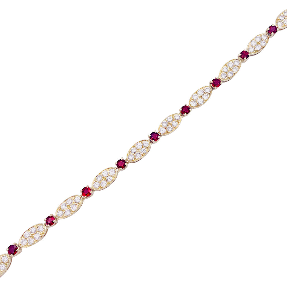 Vintage Van Cleef & Arpels bracelet, diamonds, rubies, yellow gold.