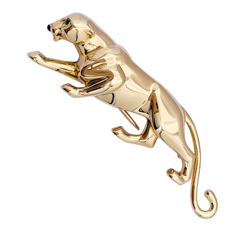 Cartier brooch, "Samantha", yellow gold, emerald and onyx.