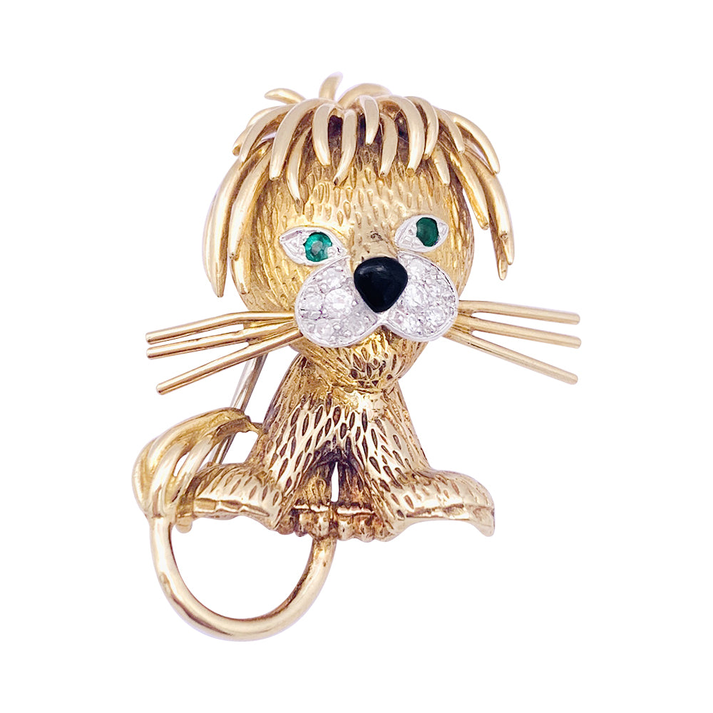 Van Cleef & Arpels brooch, "Ruffled Lion", in yellow gold, diamonds, emeralds and enamel.