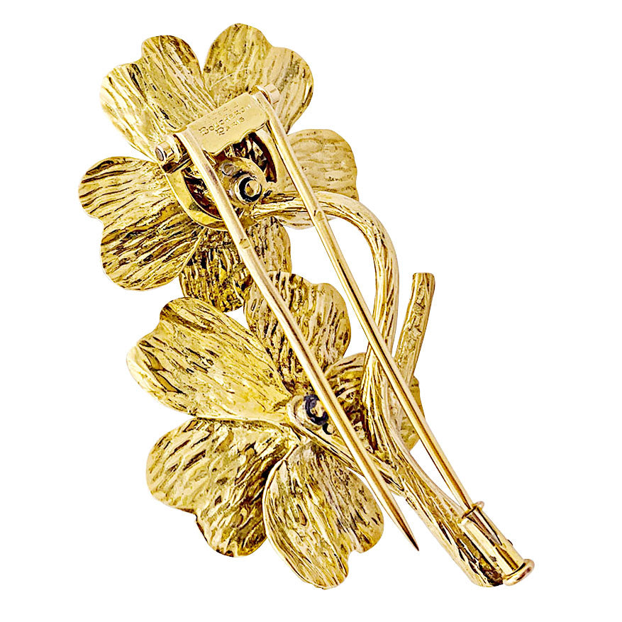 Boucheron "Flowers" clip, yellow gold, enamel, diamonds and sapphires.
