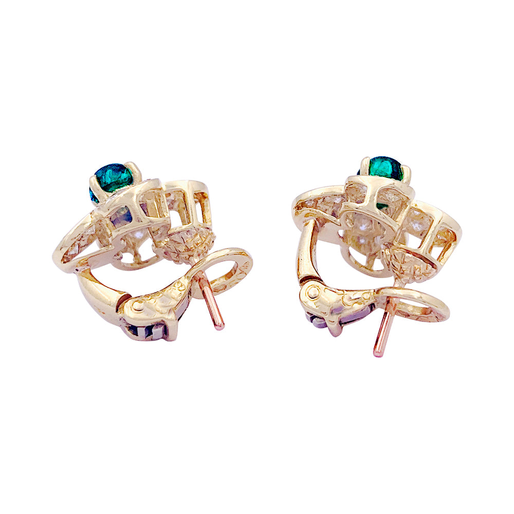 Clips Van Cleef & Arpels, "Fleurette", en or jaune, diamants et émeraudes.