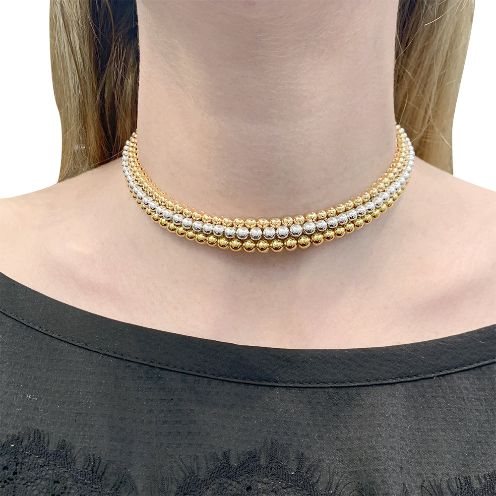 Boucheron necklace, "Grains de Raisin", three golds.