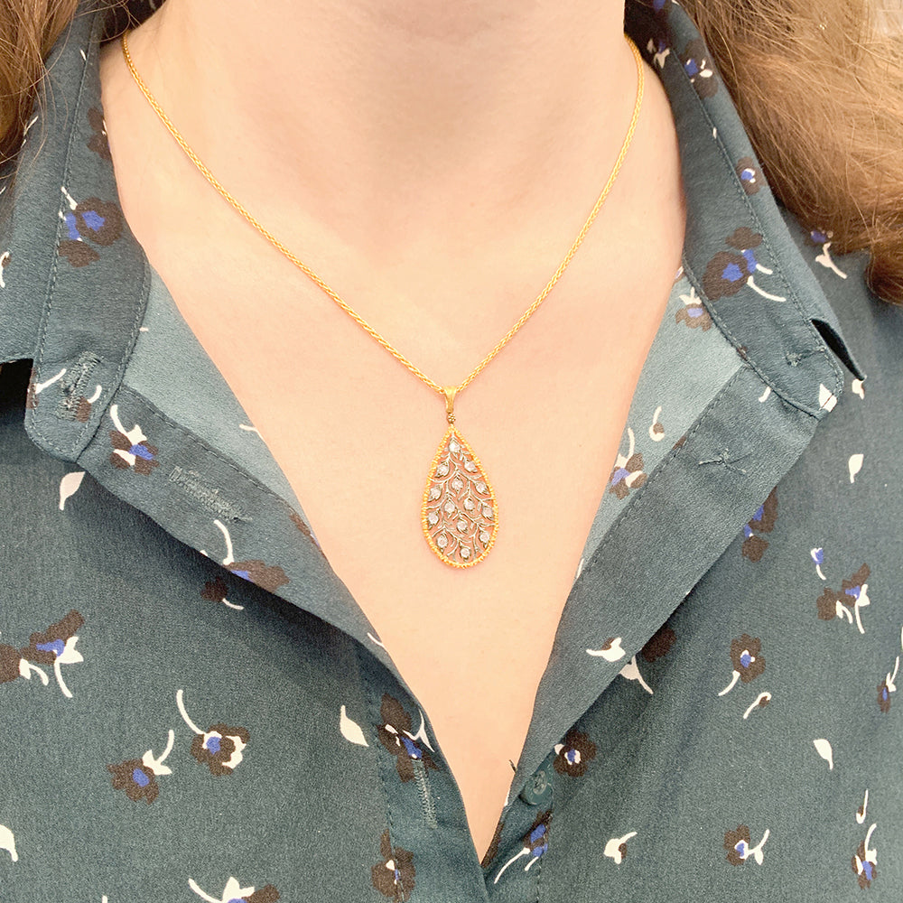 Buccellati "Ramage" necklace in two golds and diamonds.