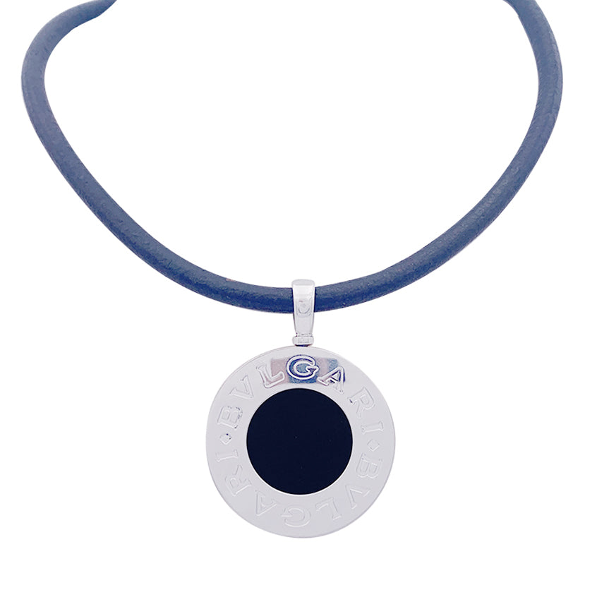 Bulgari "Bulgari Bulgari" necklace in yellow gold, steel, and onyx.