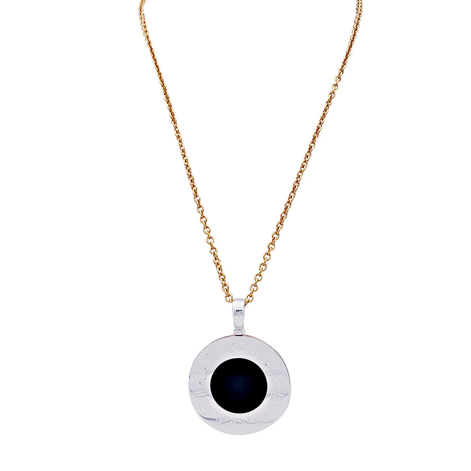 Bulgari "Bulgari Bulgari" necklace in yellow gold, steel, and onyx.