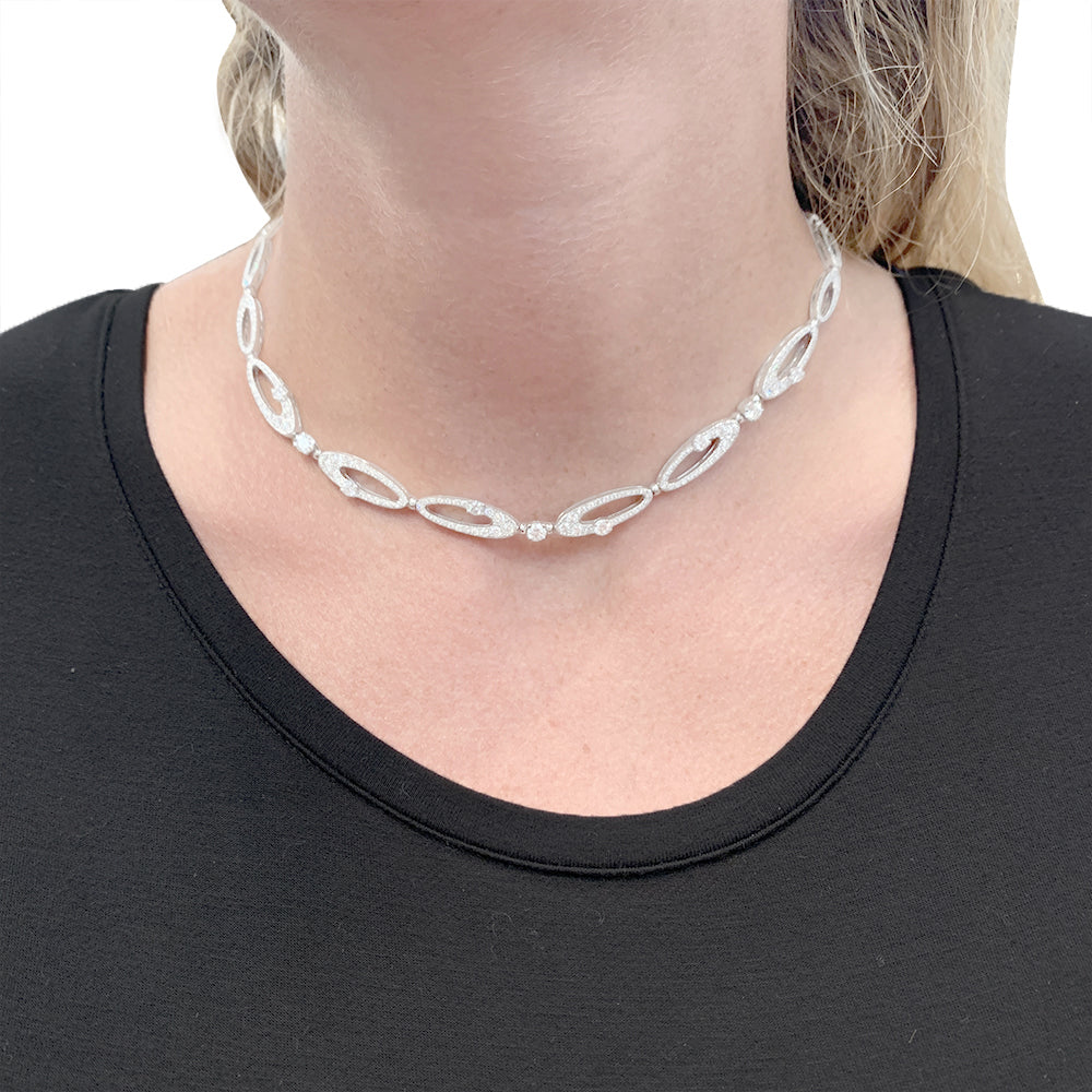 Bulgari "Elisia" necklace, white gold and diamonds.
