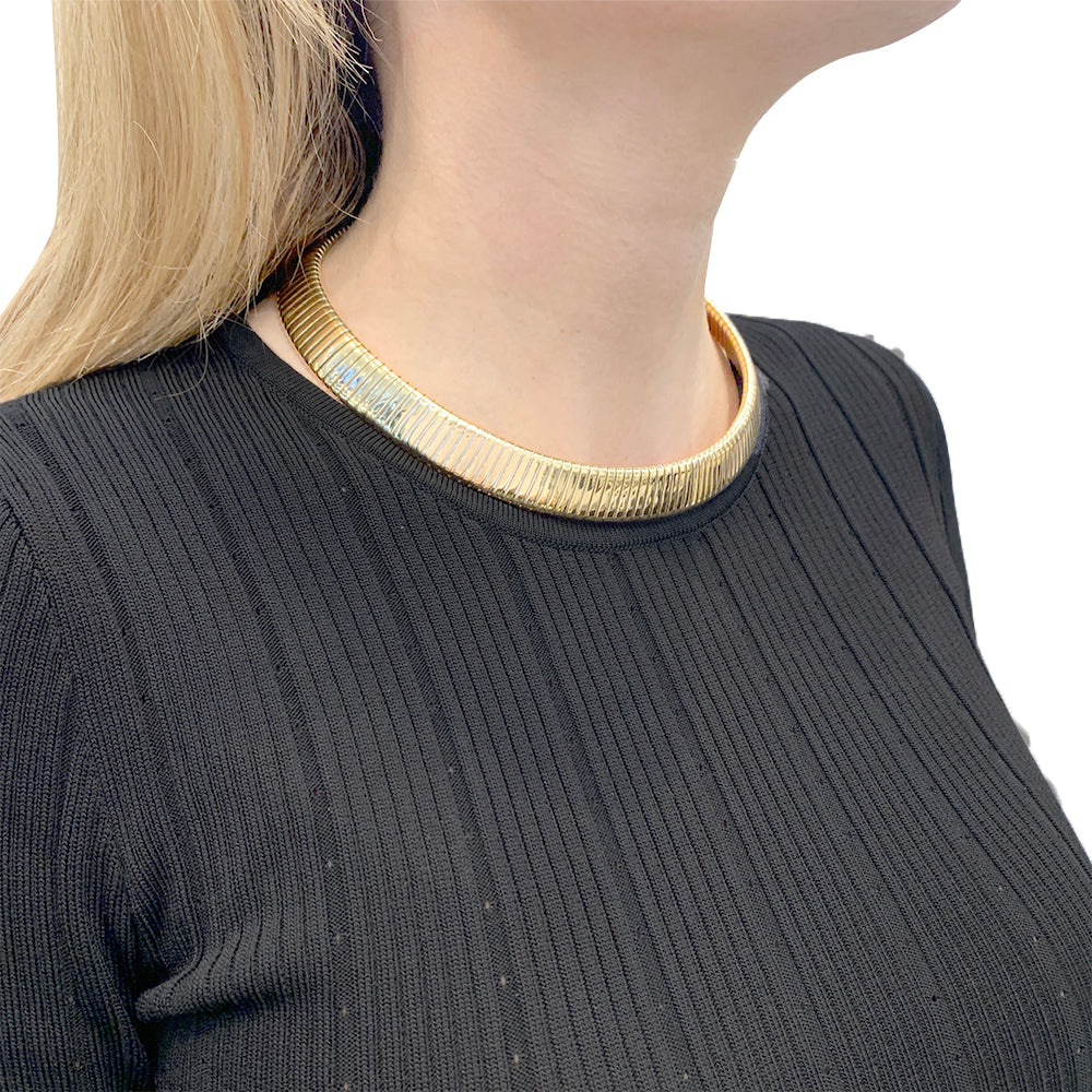 Vintage Bulgari necklace, "Tubogas", yellow gold, steel.