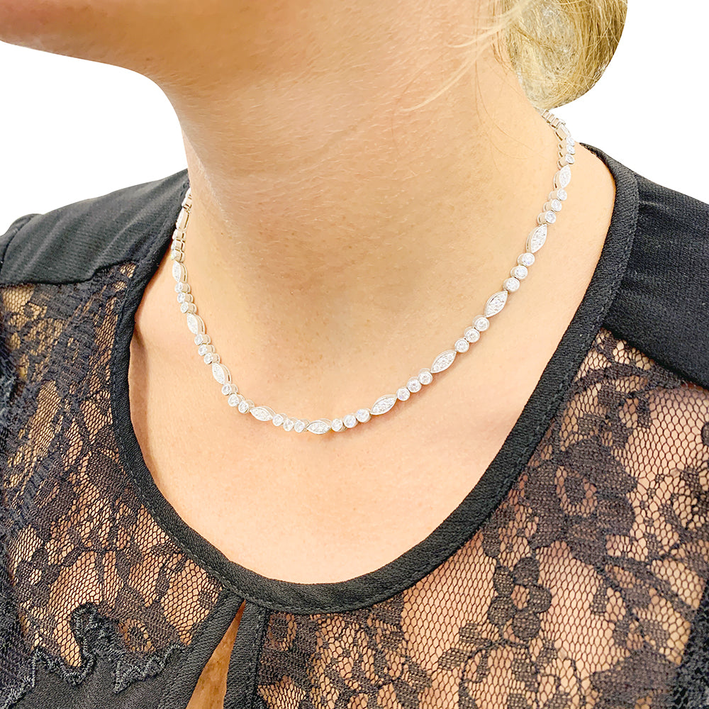 Cartier "Dentelle" necklace in platinum, white gold and diamonds.