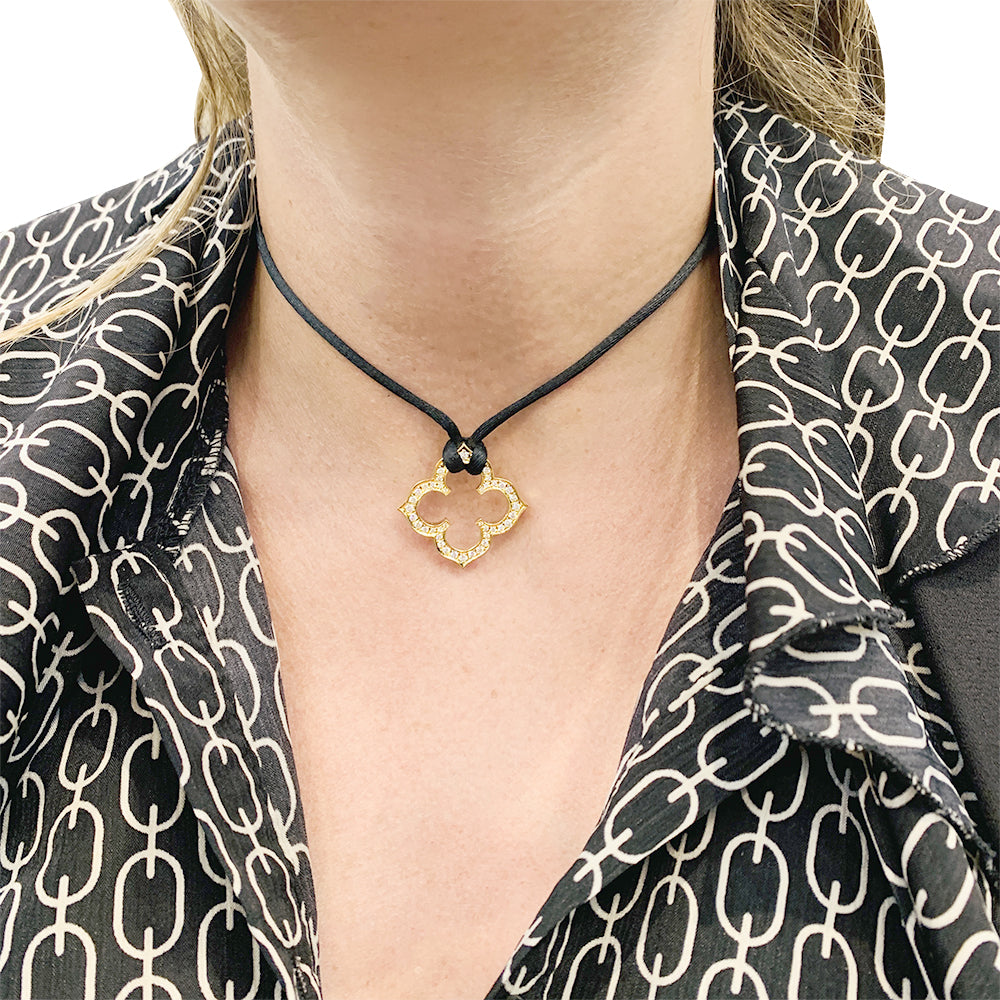 Cartier necklace, "Gothic Clover", yellow gold and diamonds.
